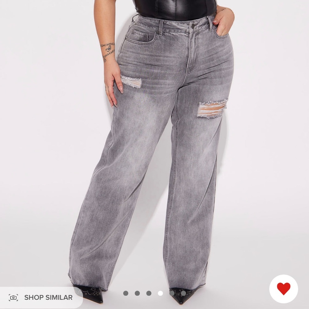 Plus size ripped straight legged jeans